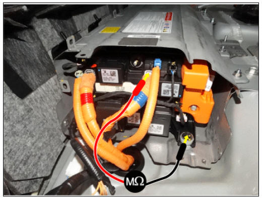 Measure the isolation resistance on the power relay assembly inverter power terminal (-)
